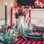 red and white candles on clear glass candle holder